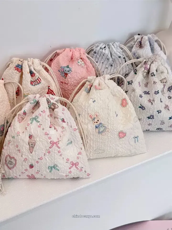 Patterned fabric bags inside a carton