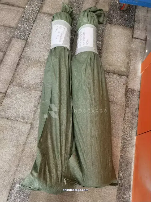 Long goods in protective wrapping