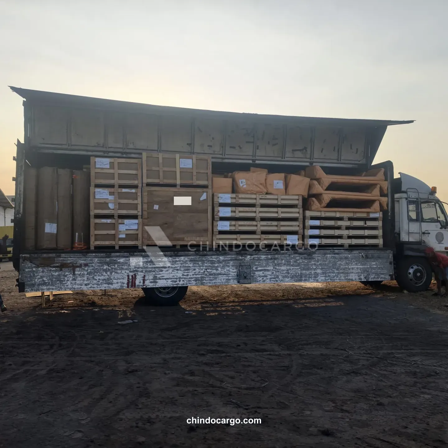 Truck carrying wooden crates